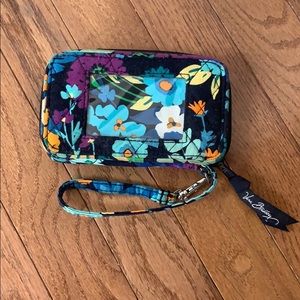 Vera Bradley patterned ID wristlet.